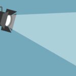 A cartoon image of a spotlight casting a beam of light.